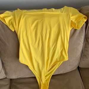 Yellow bodysuit